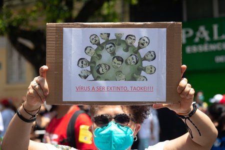Salvador, Bahia, Brazil - October 02, 2021: People protesting with banners, posters and screams at the event against the government of President Bolsonaro, in Salvador, Bahia.のeditorial素材