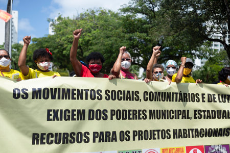 Salvador, Bahia, Brazil - October 02, 2021: People protesting with banners, posters and screams at...