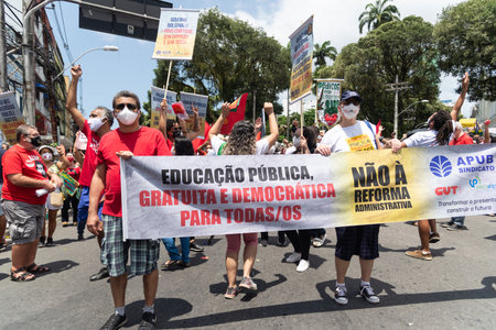 Salvador, Bahia, Brazil - October 02, 2021: People protesting with banners, posters and screams at the event against the government of President Bolsonaro, in Salvador, Bahia.のeditorial素材
