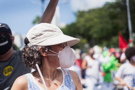 Salvador, Bahia, Brazil - October 02, 2021: People protesting with banners, posters and screams at the event against the government of President Bolsonaro, in Salvador, Bahia.のeditorial素材