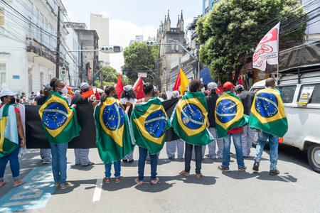 Salvador, Bahia, Brazil - October 02, 2021: People protesting with banners, posters and screams at the event against the government of President Bolsonaro, in Salvador, Bahia.のeditorial素材