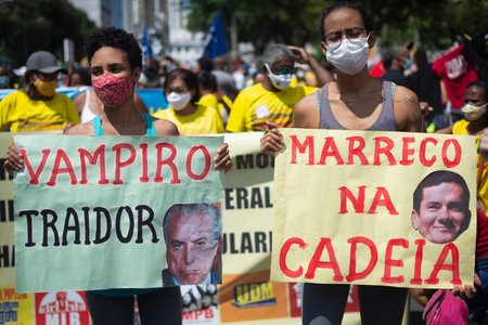 Salvador, Bahia, Brazil - October 02, 2021: People protesting with banners, posters and screams at the event against the government of President Bolsonaro, in Salvador, Bahia.のeditorial素材