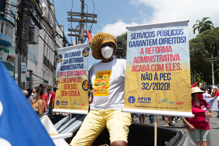 Salvador, Bahia, Brazil - October 02, 2021: People protesting with banners, posters and screams at the event against the government of President Bolsonaro, in Salvador, Bahia.のeditorial素材