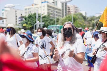 Salvador, Bahia, Brazil - October 02, 2021: People protesting with banners, posters and screams at the event against the government of President Bolsonaro, in Salvador, Bahia.のeditorial素材