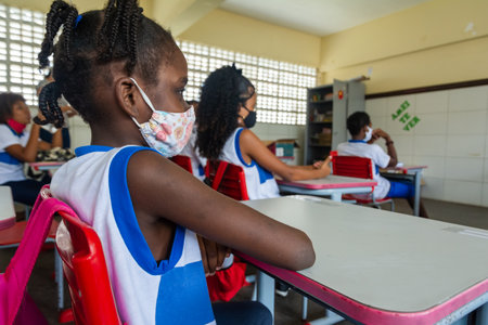 Salvador, Bahia, Brazil - October 14, 2021: Students studying in a classroom after returning to face-to-face classes during the coronavirus pandemic in Salvador, Bahia.のeditorial素材