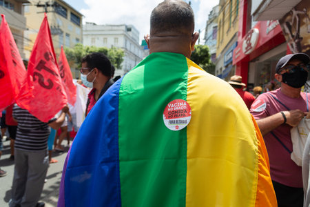 Salvador, Bahia, Brazil - October 02, 2021: Protester carries a flag during a demonstration against President Jair Bolsonaro in the city of Salvador.のeditorial素材