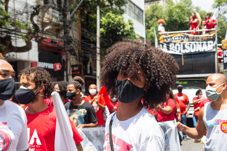 Salvador, Bahia, Brazil - October 02, 2021: Protester walks gesticulates screams during protest against President Jair Bolsonaro in the city of Salvador.のeditorial素材