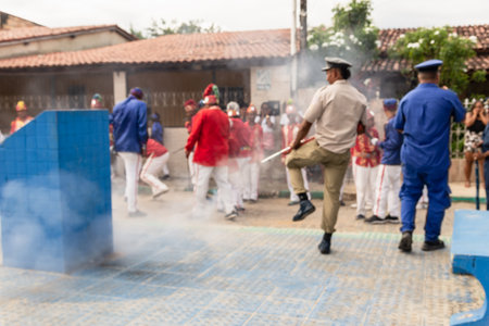 Saubara, Bahia, Brazil - August 06, 2022: Members of the Marujada cultural event stage a sword fight...