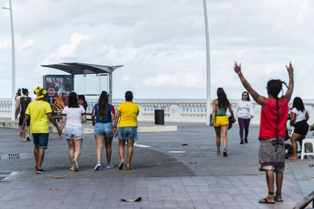 Salvador, Bahia, Brazil - June 22, 2018: Fans of Brazil walk in the streets of Barra in Salvador, before the match between Brazil versus Costa Rica for the soccer world cup in Russia in 2018.のeditorial素材