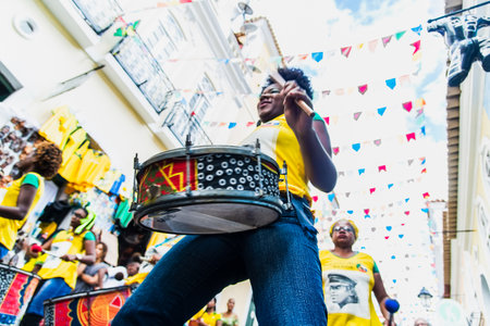 Salvador, Bahia, Brazil - June 22, 2018: Dida Band members play percussion instruments at Pelourinho in Salvador, before the match between Brazil vs Costa Rica for the 2018 soccer world cup in Russia.のeditorial素材