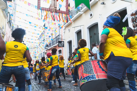 Salvador, Bahia, Brazil - June 22, 2018: Dida Band members play percussion instruments at Pelourinho in Salvador, before the match between Brazil vs Costa Rica for the 2018 soccer world cup in Russia.のeditorial素材