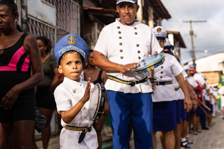Saubara, Bahia, Brazil - August 06, 2022: Members of a Marujada are dancing and singing at the Chegancas cultural meeting in Saubara, Bahia.のeditorial素材
