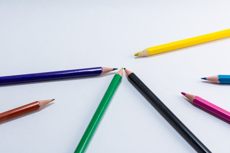Colorful wooden pencils isolated on white background. close up