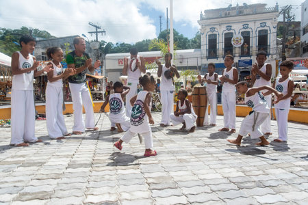 Nazare das Farinhas, Bahia, Brazil - March 23, 2016: Group of people playing capoeira in a city square in Nazare das Farinhas, Brazil.のeditorial素材