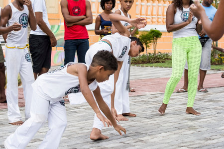 Nazare das Farinhas, Bahia, Brazil - March 23, 2016: Group of people playing capoeira in a city square in Nazare das Farinhas, Brazil.のeditorial素材