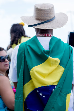 Salvador, Bahia, Brazil - March 13, 2016: Brazilians protesting against the government of President Dilma Rousseff, Brazil, at Farol da Barra.のeditorial素材