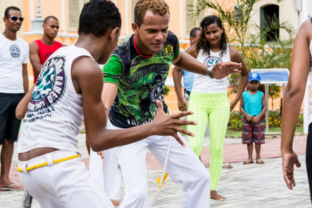 Nazare das Farinhas, Bahia, Brazil - March 23, 2016: Group of people playing capoeira in a city square in Nazare das Farinhas, Brazil.のeditorial素材