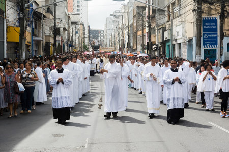 Salvador, Bahia, Brazil - May 26, 2016: Catholic priests and seminarians participate in the Corpus...