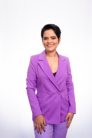 Portrait of young beautiful business woman standing and smiling. Female portrait isolated against white background.の写真素材