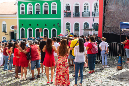 Salvador, Bahia, Brazil - December 04, 2022: Devotees of Santa Barbara are seen during the external mass at Largo do Pelourinho in Salvador, Bahia.のeditorial素材