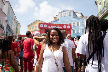 Salvador, Bahia, Brazil - December 04, 2022: A devout woman of Santa Barbara attending mass at Largo do Pelourinho in Salvador, Bahia.のeditorial素材
