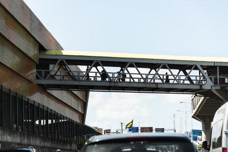 Salvador, Bahia, Brazil - May 06, 2022: Pedestrians are crossing the subway walkway in the city...
