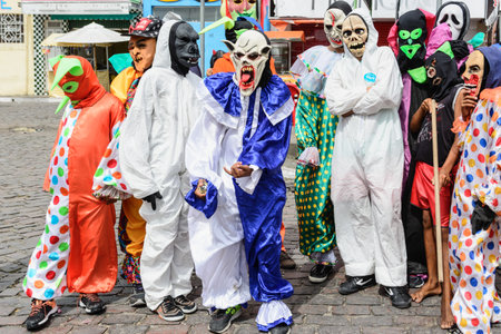 Maragogipe, Bahia, Brazil - February 27, 2017: Group of people parading dressed in horror costumes at the carnival in Maragojipe, Bahia.のeditorial素材