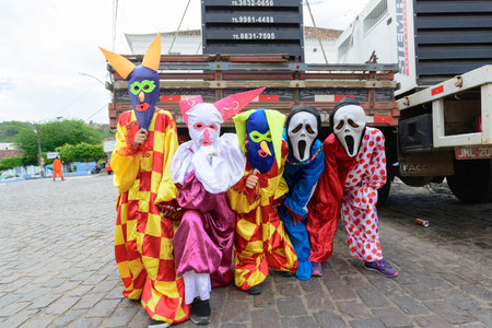 Maragogipe, Bahia, Brazil - February 27, 2017: Group of people parading dressed in horror costumes at the carnival in Maragojipe, Bahia.のeditorial素材
