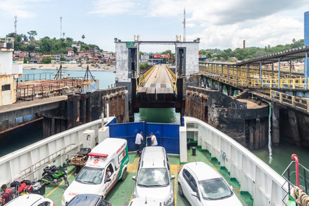 Itaparica, Bahia, Brazil - January 24, 2023: Ferry-Boat loaded with cars and passengers departing from the island of Itaparica to Salvador, Bahia.のeditorial素材