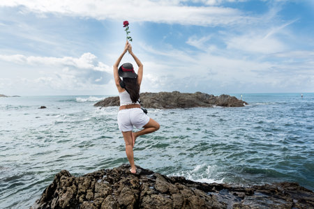 Salvador, Bahia, Brazil - February 02, 2017: Faithful Candomble women deliver flowers to the sea on the day of the feast in honor of Iemanja. Salvador, Bahia.のeditorial素材