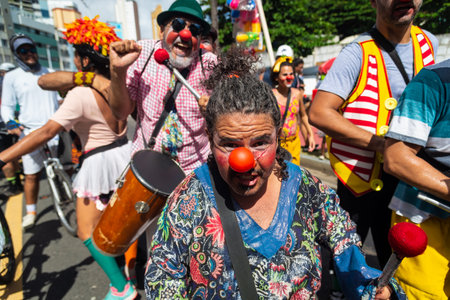 Salvador, Bahia, Brazil - February 11, 2023: Circus performers are seen during the pre-Carnival Fuzue parade in the city of Salvador, Bahia.のeditorial素材