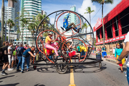 Salvador, Bahia, Brazil - February 11, 2023: Circus performers perform during the pre-Carnival Fuzue parade in the city of Salvador, Bahia.のeditorial素材