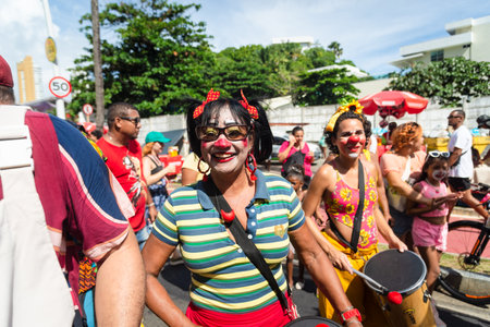Salvador, Bahia, Brazil - February 11, 2023: Circus performers are seen during the pre-Carnival Fuzue parade in the city of Salvador, Bahia.のeditorial素材