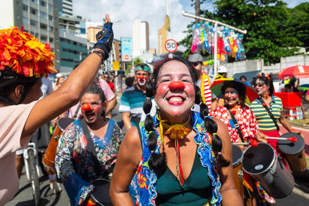 Salvador, Bahia, Brazil - February 11, 2023: Circus performers perform during the Fuzue parade in Salvador, Bahia.のeditorial素材