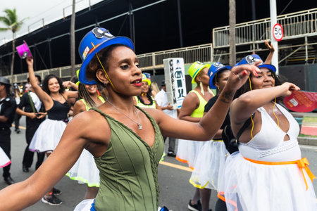 Salvador, Bahia, Brazil - February 11, 2023: Women happily parade in the pre-carnival Fuzue, in...