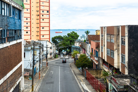 Salvador, Bahia, Brazil - January 14, 2022: View of Avenida Princesa Isabel and the residential buildings on a sunny day. City of Salvador, Bahia.のeditorial素材
