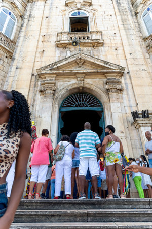 Salvador, Bahia, Brazil - December 08, 2022: Group of faithful are around the church participating in the tributes to Nossa Senhora da Conceicao da Praia, in the city of Salvador, Bahia.のeditorial素材