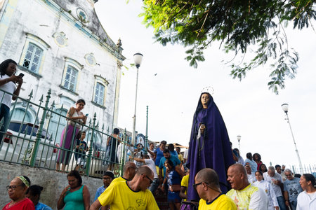 Salvador, Bahia, Brazil - April 07, 2023: Catholics carry the statue of Mary during the Passion of Christ procession in the city of Valenca, Bahia.のeditorial素材