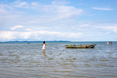 Santo Amaro, Bahia, Brazil - May 15, 2022: Candomble fans are seen on Itapema beach during the Bembe do Mercado celebrations in the city of Santo Amaro.のeditorial素材