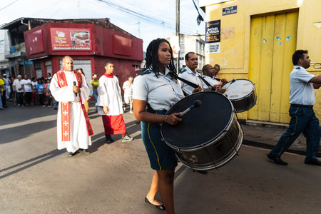Salvador, Bahia, Brazil - April 07, 2023: Catholic priest and faithful are seen during the...