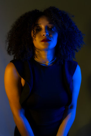 Portrait of beautiful young woman smiling and confident. color portrait in studio