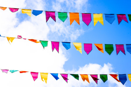 Decorative colorful flags for parties. Decoration of the feasts of Sao Joao. Bahia, Brazil.の写真素材