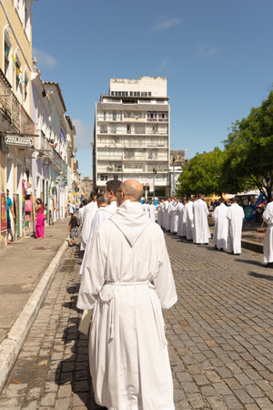 Salvador, Bahia, Brazil - June 16, 2022: Catholic priests are seen in line during a corpus christi...