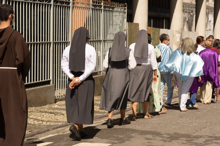 Salvador, Bahia, Brazil - June 16, 2022: Nuns and Catholic faithful participate in the corpus christi procession in the streets of Pelourinho, Salvador, Bahia.のeditorial素材