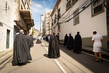 Salvador, Bahia, Brazil - June 16, 2022: Members of the Rosario dos Pretos church are seen during the corpus christi procession in Pelourinho, Salvador, Bahia.のeditorial素材