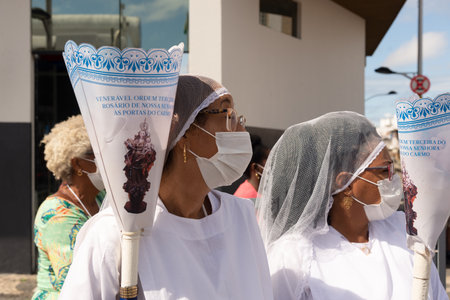 Salvador, Bahia, Brazil - June 16, 2022: Corpus Christi procession gathers thousands of people, priests and seminarians in the streets of Pelourinho, Salvador, Bahia.のeditorial素材