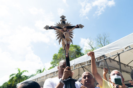 Salvador, Bahia, Brazil - January 06, 2023: Catholic faithful accompany the image of Jesus on the cross on the traditional first Friday of 2023 at the church of Senhor do Bonfim, in Salvador, Bahia.のeditorial素材