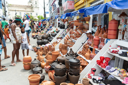 Nazare, Bahia, Brazil - April 08, 2023: People are seen buying pieces at the traditional Caxixis fair in the city of Nazare das Farinas, Bahia.のeditorial素材