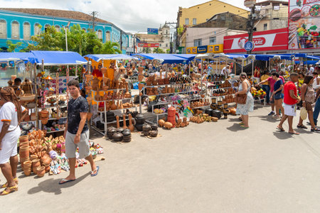 Nazare, Bahia, Brazil - April 08, 2023: People visiting and buying pieces at the traditional Caxixis fair in Nazare, Bahia.のeditorial素材