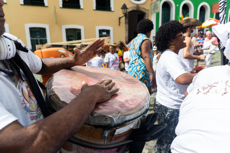 Salvador, Bahia, Brazil - July 02, 2022: Cultural group play percussion during the civic parade of the independence of Bahia, in Pelourinho in Salvador.のeditorial素材